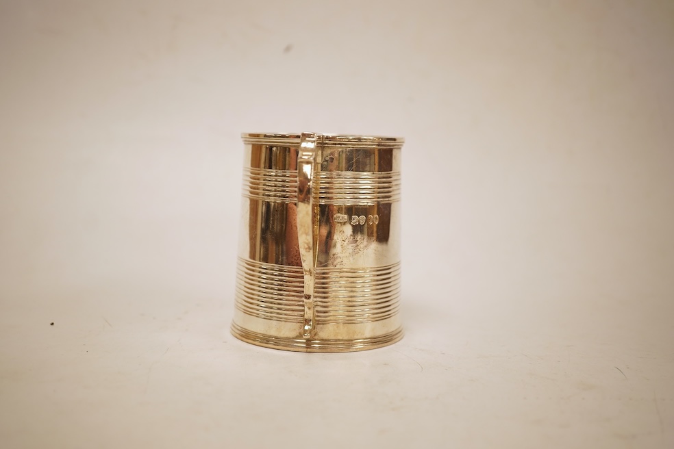 A William IV reeded silver christening mug, William Knight II, London, 1834, height 81mm, 4.7oz.